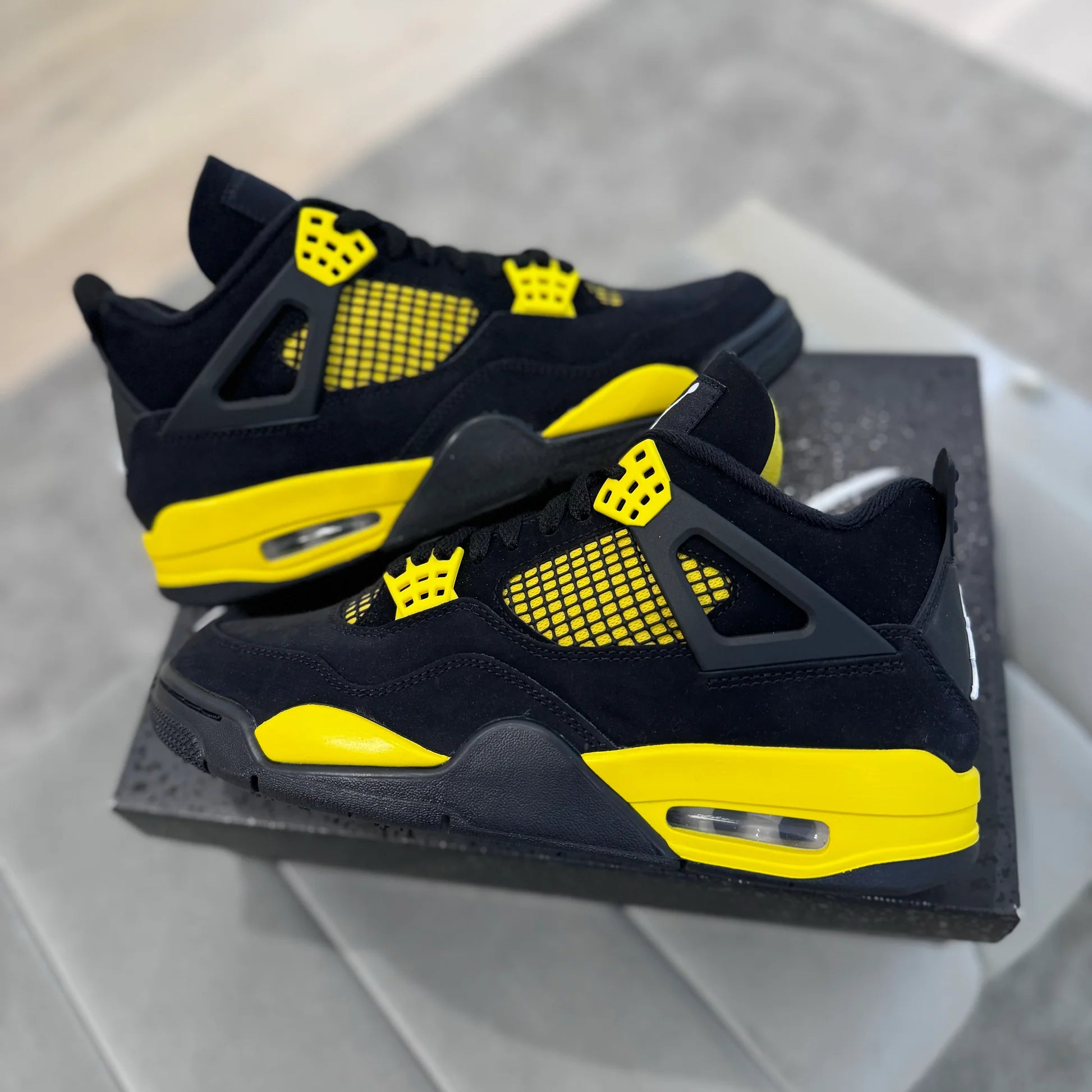 Jordan 4 Yellow Thunders